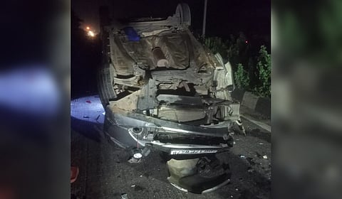 The mangled remains of the ill-fated car