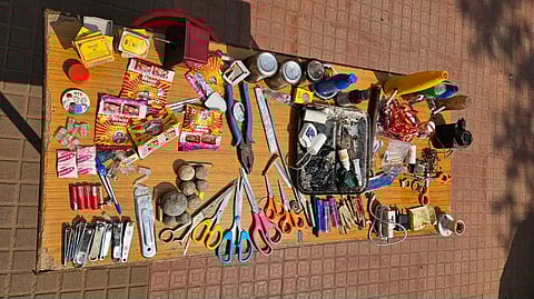 The seized items included tobacco packets, match boxes, mobile chargers, one plier, electrical wire, pencil batteries, multiple nail-cutters, pointed metal objects among other things.