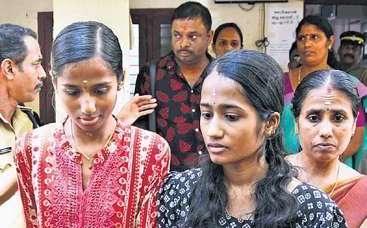 Sajitha’s daughters Athulya and Akhila, and their aunt Saritha coming out of courtroom after verdict was declared