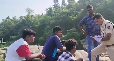 Police questioning the students near in Ghagarai nullah in Lathikata block.