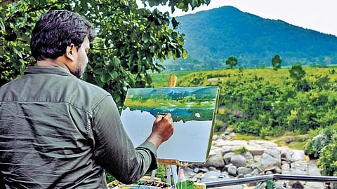 Artist Pothina Venkata Hanumanthu paints a live watercolour scene, capturing the everyday beauty of Vizag.