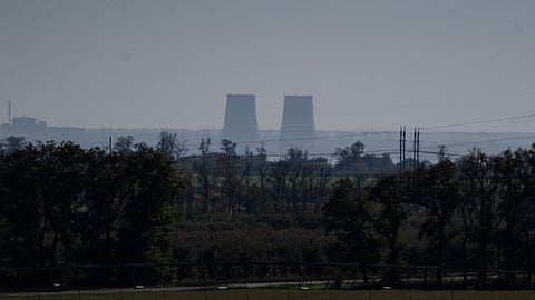 FILE - Zaporizhzhia nuclear power plant is seen from around twenty kilometers away in an area in the Dnipropetrovsk region, Ukraine, Monday, Oct. 17, 2022