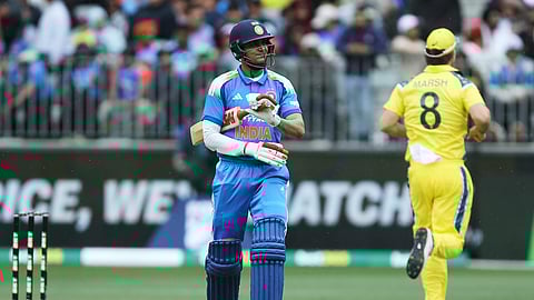 India's Shubman Gill walks off after being dismissed by Australia's Nathan Ellis.