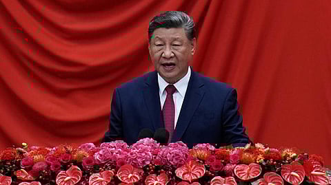 Chinese President Xi Jinping speaks at the National Day Reception at the Great Hall of the People on the eve of the 76th anniversary of the founding of the People's Republic of China in Beijing, Tuesday, Sept. 30, 2025.