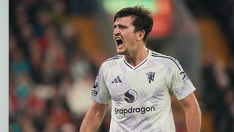 Manchester United’s Harry Maguire celebrates after scoring his side’s second goal during the English Premier League match between Liverpool and Manchester United in Liverpool, England.
