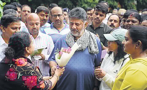 DCM DK Shivakumar interacts with citizens during ‘Walk with Bengaluru’ event in Koramangala on Sunday.