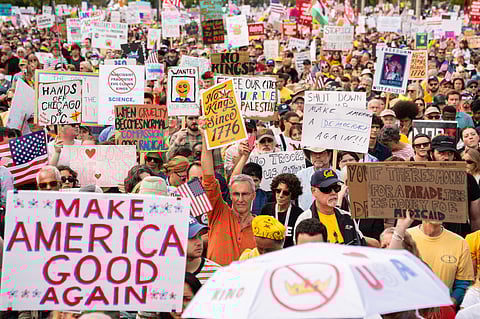 Crowds gather to listen to Sen. Bernie Sanders, I-Vt., during a No Kings protest, Saturday, Oct. 18, 2025, in Washington.