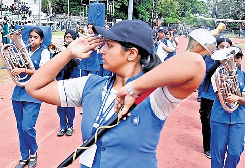 Students on Monday rehearse for the parade for the opening ceremony of the
67th State School Sports Meet