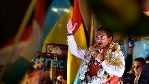 Bolivia's presidential candidate for the Christian Democratic Party (PDC), Rodrigo Paz, delivers a speech to supporters following the results of the run-off presidential election in La Paz, on October 19, 2025.
