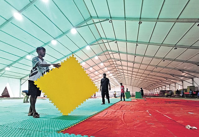 Makeshift arrangements being made at the Central Stadium, one of the 12 venues across the district