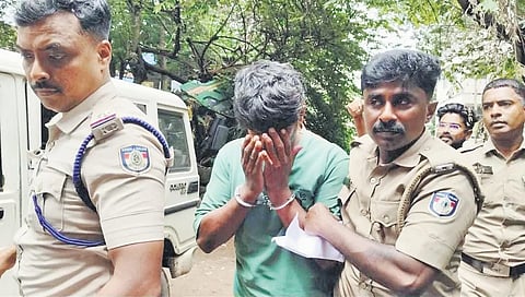 Benjamin, the accused in the attempted sexual assault case, being taken to
Attingal court by the police on Monday