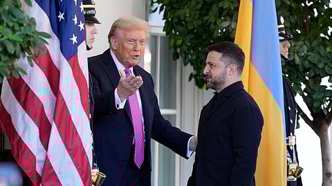 US President Donald Trump, left, greets Ukraine's President Volodymyr Zelenskyy at the White House, Friday, Oct. 17, 2025, in Washington.