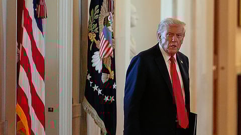 US President Donald Trump arrives to speak during an event to welcome the 2025 LSU and LSU-Shreveport national champion baseball teams in the East Room of the White House, Monday, Oct. 20, 2025, in Washington.