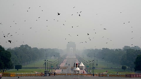 India Gate engulfed in a layer of smog, in New Delhi, Monday, Oct. 20, 2025.