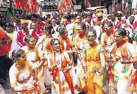 Young supporters of the BJP dance during the nomination rally of the party’s Jubilee Hills candidate Lankala Deepak Reddy in Hyderabad on Tuesday.