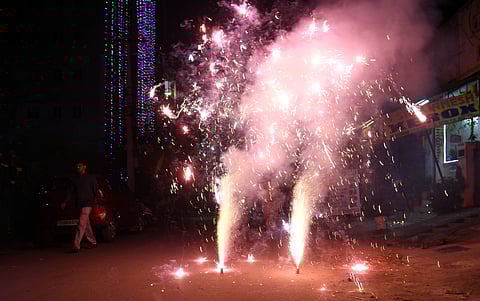 People bursting fire crackers on the occassion of Diwali festival in Hyderabad.