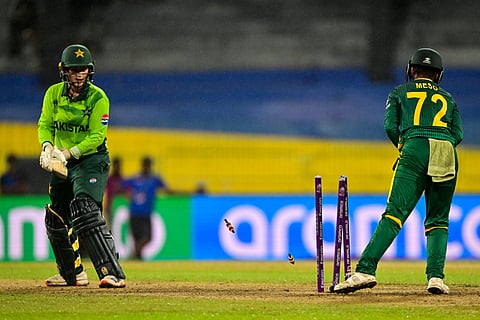South Africa's wicketkeeper Karabo Meso (R) stumps out Pakistan's Natalia Pervaiz (L) during the ICC Women's Cricket World Cup 2025 ODI match between Pakistan and South Africa on October 21, 2025.