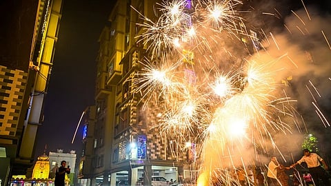21/10/2025 - Bhubaneswar - People burst fireworks celebrating Diwali in Bhubaneswar on Monday night. Express / DEBADATTA MALLICK