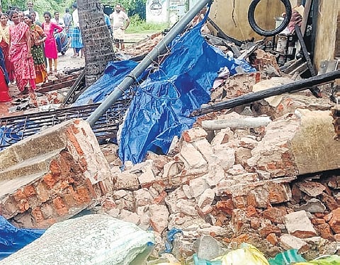 Debris of the collapsed wall in Marakanam on Wednesday.