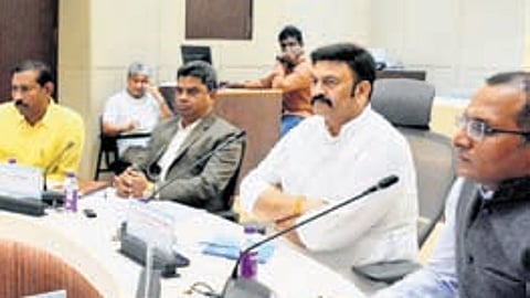 Deputy Speaker K Raghu Rama Krishna Raju reviews health and food safety with officials in Vizag.