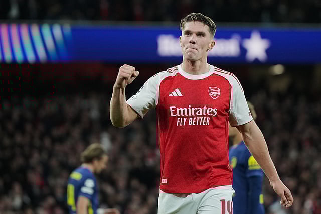 Arsenal's Viktor Gyoekeres celebrates after scoring his side's third goal during the Champions League opening phase football match between Arsenal and Atletico Madrid in London, England, Tuesday, Oct. 21, 2025.