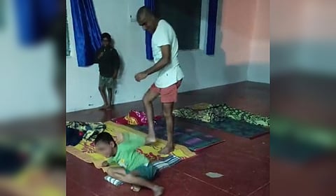 A video grab of Veeresh Hiremath kicking the boy