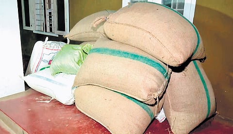 Seized cardamom sacks at Maradu police station.