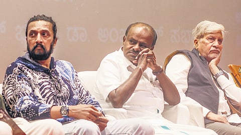Union minister HD Kumaraswamy (centre) attends a function to felicitate veteran filmmaker SV Rajendra Singh Babu (right) for the latter’s 50 years in the film industry, as actor Sudeep looks on, in Bengaluru on Thursday