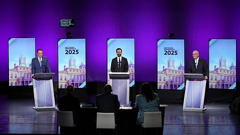 From left, Independent candidate Andrew Cuomo, Democratic candidate Zohran Mamdani and Republican candidate Curtis Sliwa participate in a second New York City mayoral debate at LaGuardia Community College in the Queens borough of New York, Wednesday, Oct. 22, 2025.