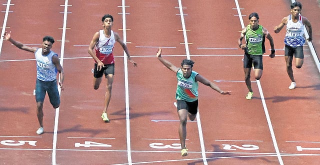 Athul T M of Alappuzha wins gold in the junior boys 100-m race in the State School Sports Meet in Thiruvananthapuram on Thursday