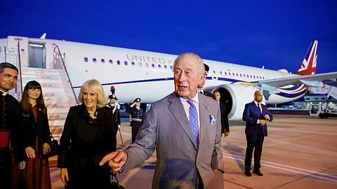 Britain's King Charles III and Queen Camilla arrive at Ciampino 31st Wing Airport in the outskirts of Rome on Wednesday, Oct. 22, 2025, a day before their state visit to the Vatican.