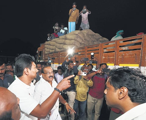Deputy Chief Minister Udhayanidhi Stalin inspecting paddy sacks in Thanjavur on Thursday.