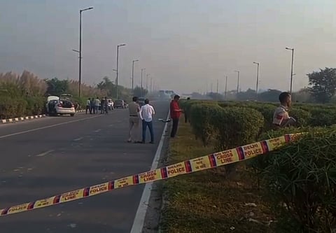 Police personnel investigate the site after at least four gangsters have reportedly been shot dead in an encounter conducted by a joint team of Delhi Police Crime Branch and Bihar Police.