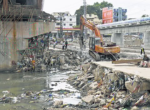 Demolition of Moosarambagh Causeway Bridge underway in Hyderabad on Thursday.