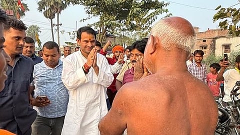 Former Bihar minister Tej Pratap Yadav during a campaign at Bihar's Mahua constituency.