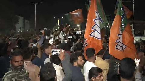 BJP workers celebrating after the party won a seat in the J&K Rajya Sabha polls.