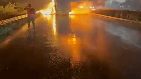 A private bus caught fire on National Highway 44 in Kurnool district on early hours of Friday.