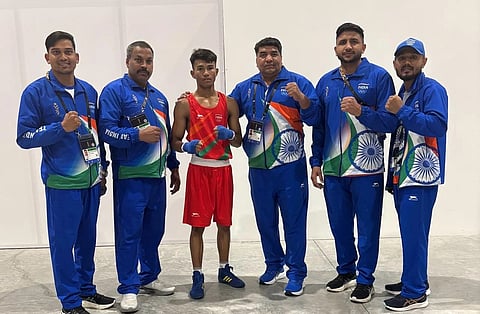 M Lanchenba Singh (c) with coaches and support staff members