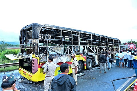 Th remainder of the bus' structure after it burst into flames near Chinnatekuru village in Kurnool district