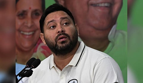 RJD Leader of Opposition, Tejashwi Yadav, addresses a press conference at his official residence, in Patna, Sunday, Oct. 26, 2025.
