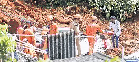 Fire and Rescue Services personnel engaged in collecting important items from the house of Sathi, which was also buried under debris.