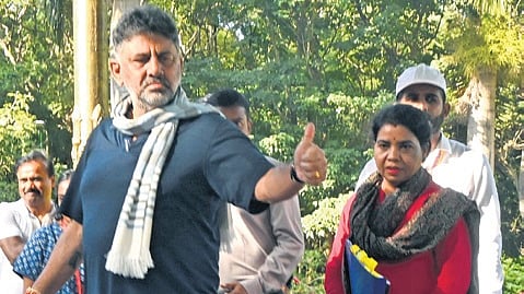DCM DK Shivakumar interacts with walkers during the ‘Walk with Bengaluru’ event at Cubbon Park on Sunday.