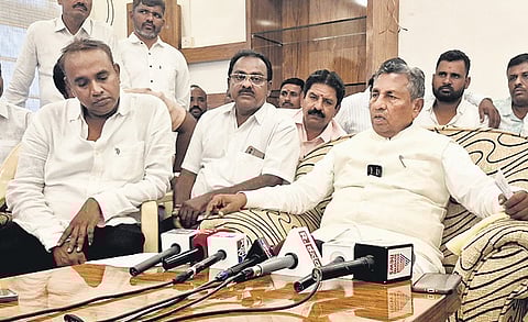 Food and Civil Supplies Minister KH Muniyappa addresses the media in Shivamogga on Sunday.