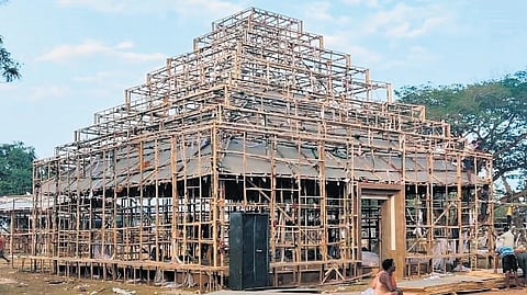 Construction of the control room themed on Lingaraj temple entrance underway at the lower Balijatra ground.