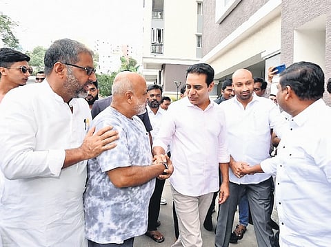 BRS working president KT Rama Rao interacts with the residents of a gated community in the Jubilee Hills Assembly constituency on Sunday.