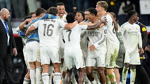 Real Madrid players celebrate after a La Liga soccer match between Real Madrid and Barcelona in Madrid, Spain, Sunday, Oct. 26, 2025.