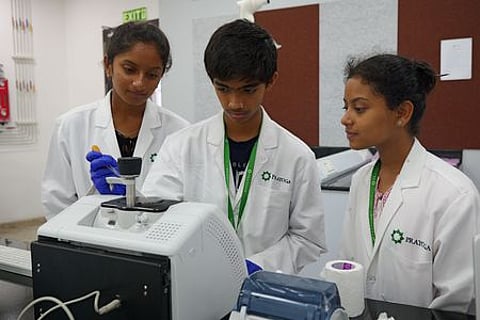 The three young researchers: R Usha, R Nalini and Aniketh V Bhat.