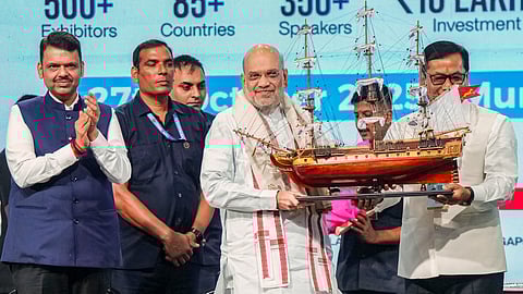 In this image received on Oct. 27, 2025, Union Home Minister Amit Shah, Maharashtra CM Devendra Fadnavis and Union Minister Sarbananda Sonowal, during an event marking 'India Maritime Week 2025', in Mumbai, Maharashtra.