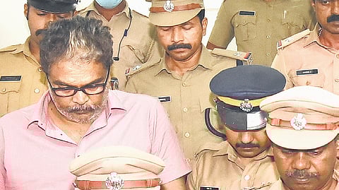 Police escort Murari Babu from Ranni Judicial First Class Magistrate Court to Thiruvananthapuram for detailed questioning on Tuesday.