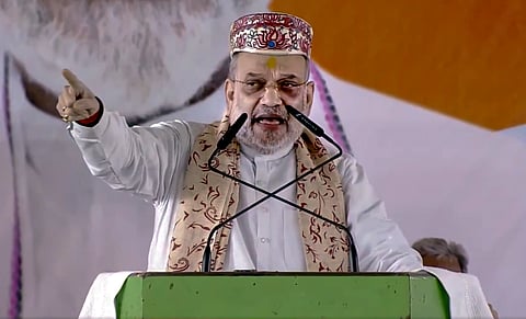 In this image posted on Oct. 29, 2025, Union Home Minister Amit Shah addresses a gathering ahead of the Bihar Assembly elections, in Darbhanga, Bihar.